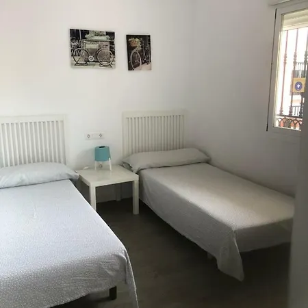 ílios Carihuela *